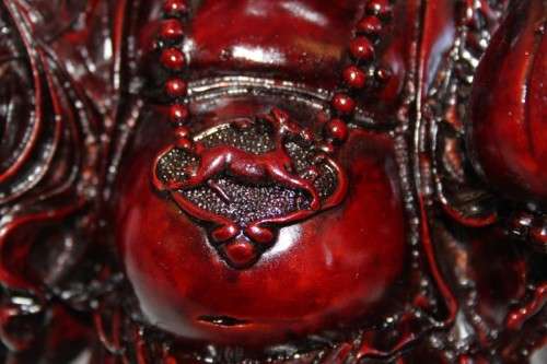 AN EXQUISITE (LARGE) CHINESE LAUGHING BUDDHA (BUDAI) IN A TRADITIONAL RED LACQUERED FINISH