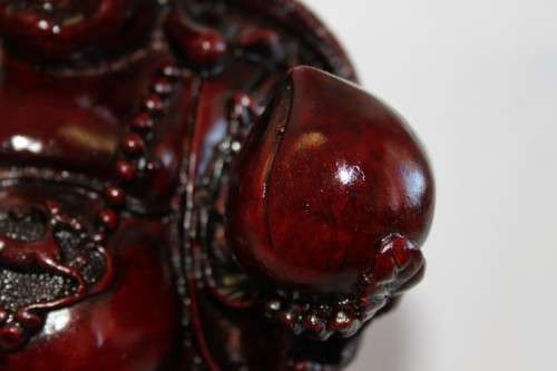 AN EXQUISITE (LARGE) CHINESE LAUGHING BUDDHA (BUDAI) IN A TRADITIONAL RED LACQUERED FINISH