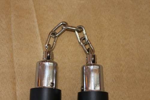 AN AWESOME "TOY" FOAM COVERED "NUNCHAKU" MARTIAL ART WEAPON IN ITS ORIGINAL PLASTIC BAG