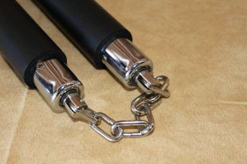AN AWESOME "TOY" FOAM COVERED "NUNCHAKU" MARTIAL ART WEAPON IN ITS ORIGINAL PLASTIC BAG