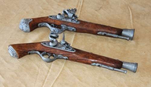 2x AWESOME "ORNAMENTAL" BLACK POWDER FLINT-LOCK PISTOLS w/ METAL EMBELLISHMENTS & MUZZLES bid/pistol