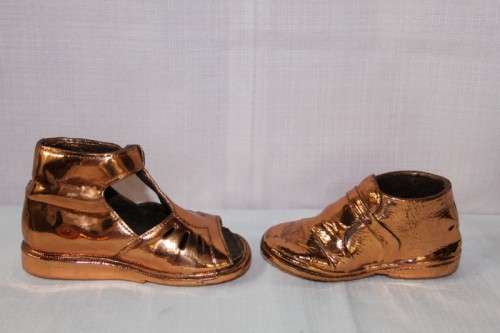 FOUR STUNNING "BOOTEE BRONZING" COPPER PLATED BABY SHOES IN FANTASTIC CONDITION bid/shoe