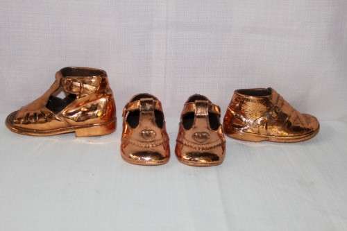 FOUR STUNNING "BOOTEE BRONZING" COPPER PLATED BABY SHOES IN FANTASTIC CONDITION bid/shoe