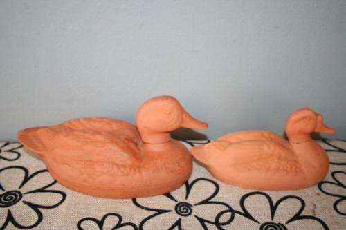 A gorgeous pair of terracotta stoneware ornamental ducks - perfect for the garden or pond