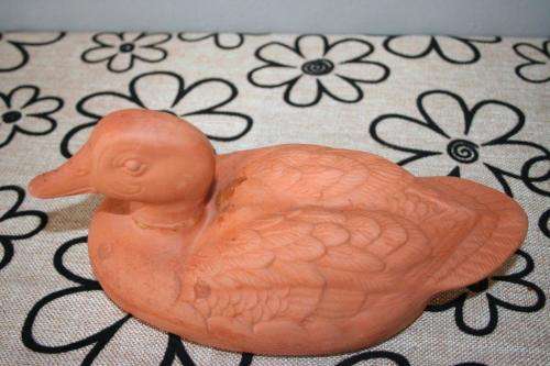 A gorgeous pair of terracotta stoneware ornamental ducks - perfect for the garden or pond