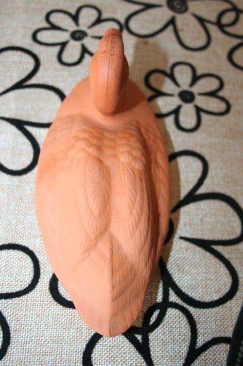 A gorgeous pair of terracotta stoneware ornamental ducks - perfect for the garden or pond