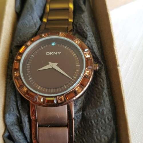 A STUNNING "DKNY" BRONZE-CUT LADIES WRIST WATCH WITH SMOKEY TOPAZ CRYSTALS IN FABULOUS CONDITION