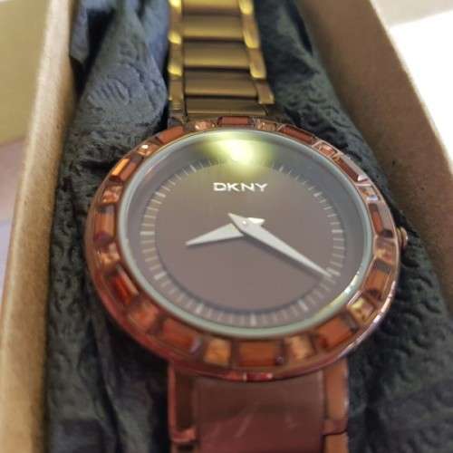 A STUNNING "DKNY" BRONZE-CUT LADIES WRIST WATCH WITH SMOKEY TOPAZ CRYSTALS IN FABULOUS CONDITION