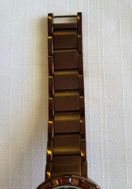 A STUNNING "DKNY" BRONZE-CUT LADIES WRIST WATCH WITH SMOKEY TOPAZ CRYSTALS IN FABULOUS CONDITION