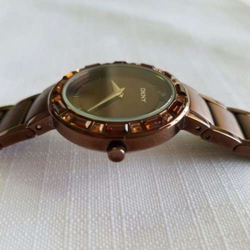 A STUNNING "DKNY" BRONZE-CUT LADIES WRIST WATCH WITH SMOKEY TOPAZ CRYSTALS IN FABULOUS CONDITION