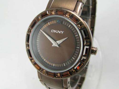 A STUNNING "DKNY" BRONZE-CUT LADIES WRIST WATCH WITH SMOKEY TOPAZ CRYSTALS IN FABULOUS CONDITION