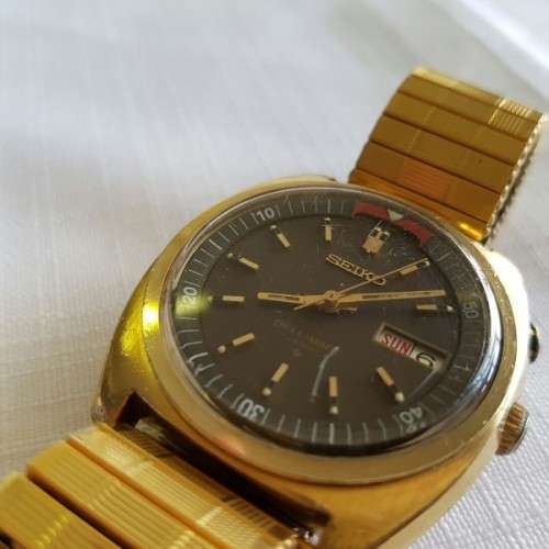A STUNNING VINTAGE GOLD PLATED SEIKO AUTOMATIC "BELL-MATIC" (MODEL 4006-6031) GENTS WRIST WATCH