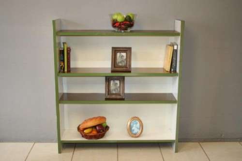 A GORGEOUS WHITE AND BROWN BOOK CASE WITH GREEN FACADES - PERFECT FOR A STUDY OR OFFICE