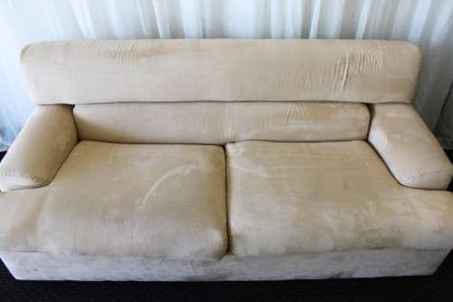 AN AWESOME TAN SUEDE FEEL LARGE 2-SEATER COMFORTABLE COUCH IN AWESOME CONDITION