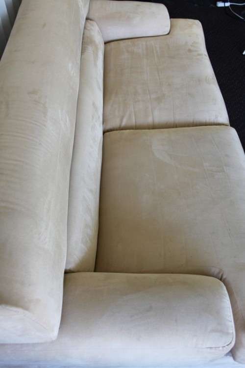 AN AWESOME TAN SUEDE FEEL LARGE 2-SEATER COMFORTABLE COUCH IN AWESOME CONDITION