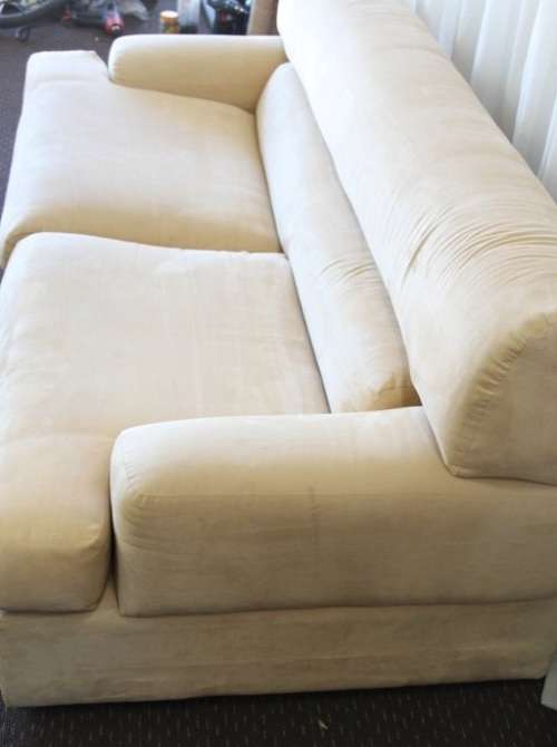 AN AWESOME TAN SUEDE FEEL LARGE 2-SEATER COMFORTABLE COUCH IN AWESOME CONDITION
