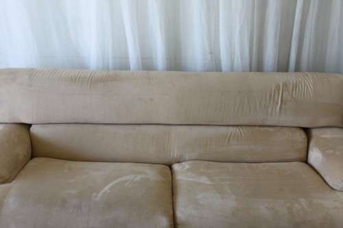 AN AWESOME TAN SUEDE FEEL LARGE 2-SEATER COMFORTABLE COUCH IN AWESOME CONDITION