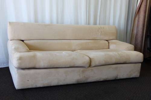 AN AWESOME TAN SUEDE FEEL LARGE 2-SEATER COMFORTABLE COUCH IN AWESOME CONDITION
