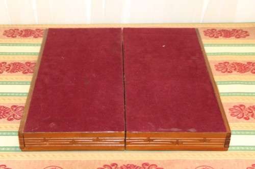 A SUPERB VINTAGE HAND-CARVED ORIENTAL FOLDING CHESS BOARD AND CARVED CHESS SET IN AWESOME CONDITION