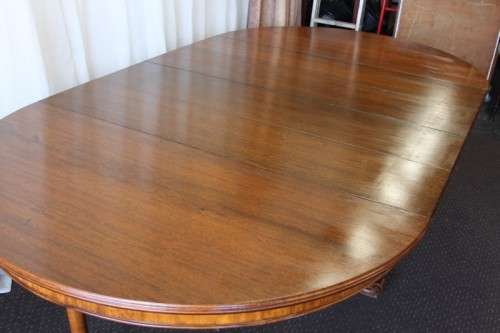 An awesome 4 To 10-seater extendable dining table w/ a spectacular carved centre pedestal | RS17