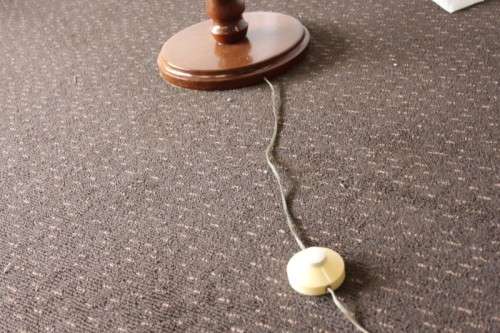 A SPECTACULAR RETRO WOODEN FLOOR LAMP WITH A FOOT SWITCH AND TONS OF CHARACTER