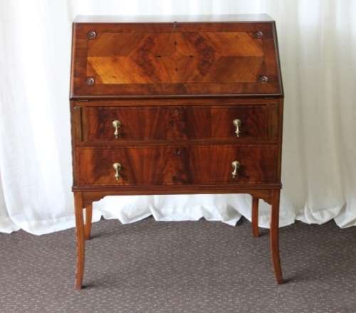 A MAGNIFICENT ANTIQUE FLIP-TOP WRITING DESK WITH TWO DRAWERS AND INLAY DETAILING