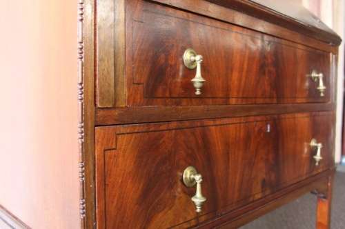 A MAGNIFICENT ANTIQUE FLIP-TOP WRITING DESK WITH TWO DRAWERS AND INLAY DETAILING