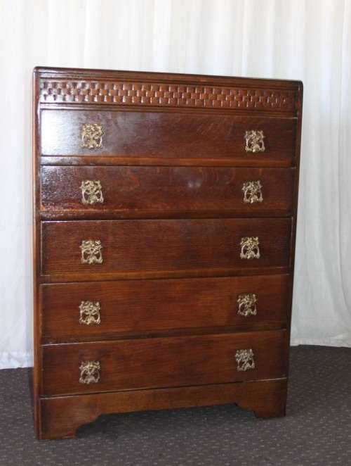 A beautiful Solidly built 5-drawer chest of drawers with stunning styling & ornate handles
