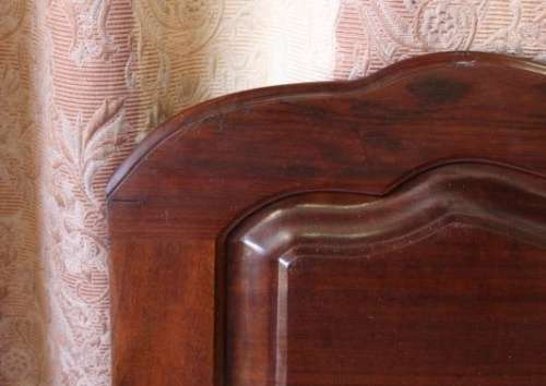 A SUPERB ANTIQUE SOLID STINK WOOD BALL AND CLAW HEADBOARD AND FOOT BOARD SET