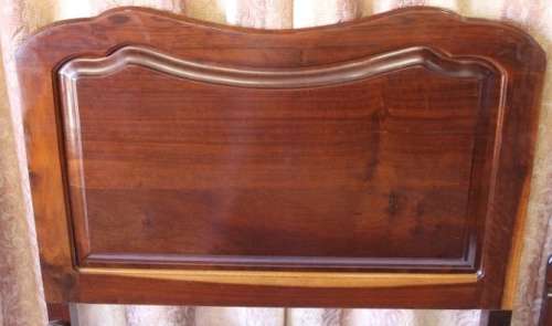 A SUPERB ANTIQUE SOLID STINK WOOD BALL AND CLAW HEADBOARD AND FOOT BOARD SET