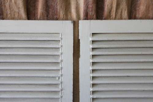 AN AWESOME PAIR OF "WHITE" SOLID TEAK WINDOW "SHUTTERS" IN GREAT CONDITION