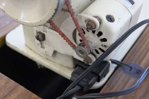 AN AMAZING VINTAGE (WORKING) "FRICK" SEWING MACHINE IN ITS ORIGINAL WOODEN CABINET