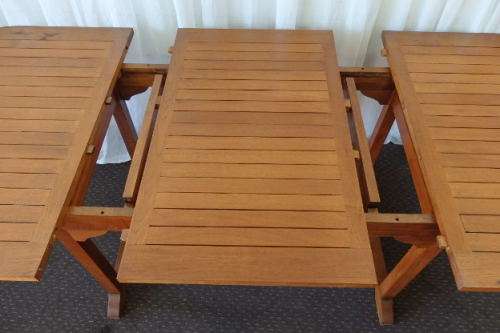 A STUNNING 6 TO 8 SEATER OUTDOOR EXTENDABLE DINING TABLE WITH A "HIDDEN" EXTENSION COMPARTMENT