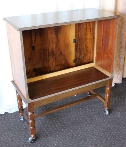 AN AMAZING RETRO (c1970's) WOODEN CABINET ON ITS ORIGINAL CASTORS WITH AWESOME RELIEF DETAILING