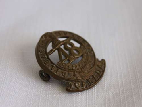 A FANTASTIC "48th HIGHLANDERS" OF CANADA (DILEAS GU BRATH) SHOULDER TITLE BADGE