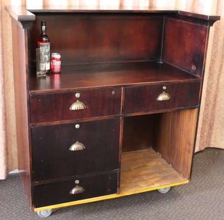 AN INCREDIBLE MOBILE BAR/ DRINKS CABINET/ PODIUM ON CASTORS IN GREAT CONDITION!!!!