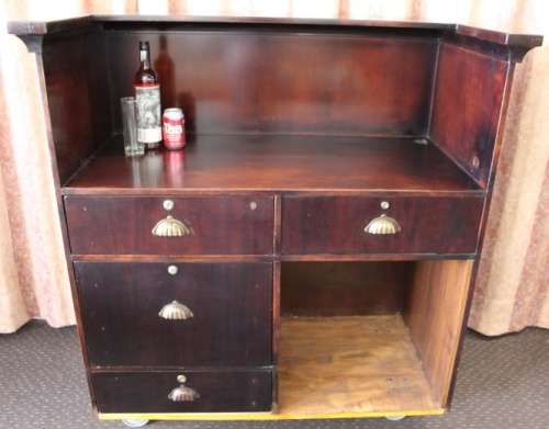 AN INCREDIBLE MOBILE BAR/ DRINKS CABINET/ PODIUM ON CASTORS IN GREAT CONDITION!!!!