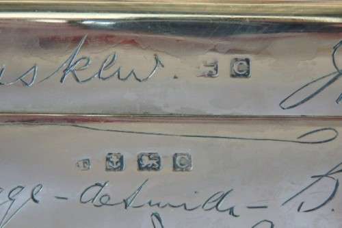 An exquisite antique (1902) hallmarked sterling silver engraved cigar/ cigarette box