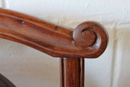 Two beautiful solid Stink Wood Ball & Claw occasional arm chairs with wicker backrests!!! bid/chair