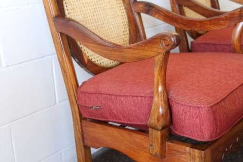 Two beautiful solid Stink Wood Ball & Claw occasional arm chairs with wicker backrests!!! bid/chair