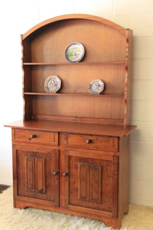 A stunning teak buffet server w/ two display shelves and ample storage space in remarkable condition
