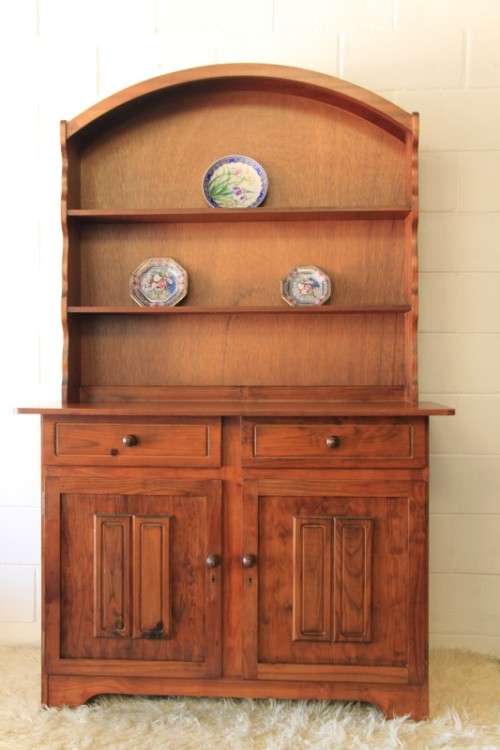 A stunning teak buffet server w/ two display shelves and ample storage space in remarkable condition