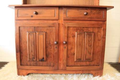 A stunning teak buffet server w/ two display shelves and ample storage space in remarkable condition