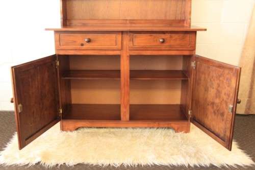 A stunning teak buffet server w/ two display shelves and ample storage space in remarkable condition