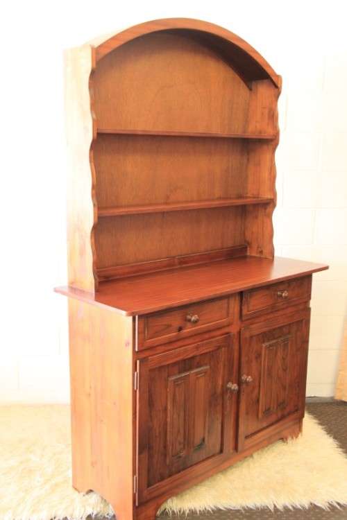 A stunning teak buffet server w/ two display shelves and ample storage space in remarkable condition