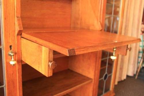 An awesome solid oak writing desk/ cabinet with incredible stained glass panels and ornate handles