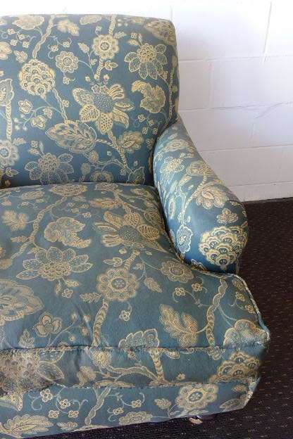 A beautiful "oversized" comfortable vintage arm chair on its original castors in fabulous condition