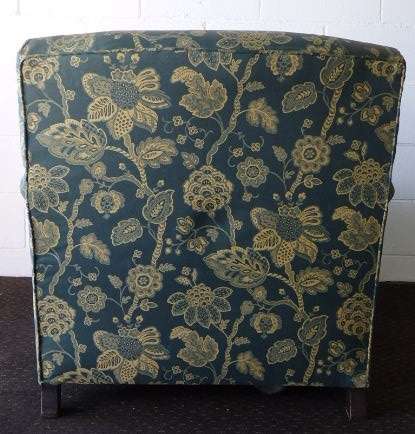 A beautiful "oversized" comfortable vintage arm chair on its original castors in fabulous condition