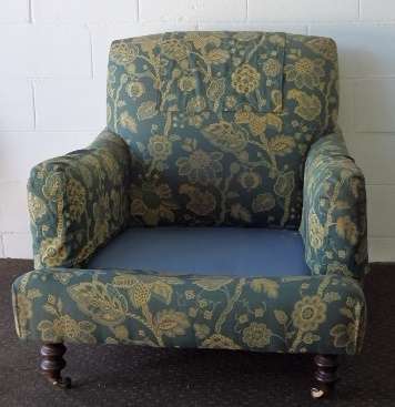 A beautiful "oversized" comfortable vintage arm chair on its original castors in fabulous condition