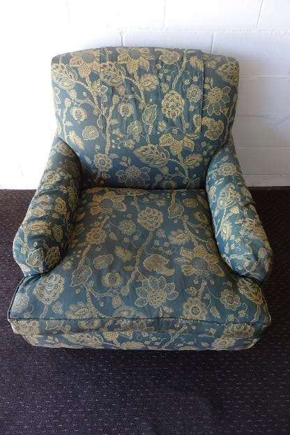 A beautiful "oversized" comfortable vintage arm chair on its original castors in fabulous condition